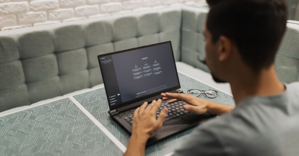 Person using AI software on a laptop