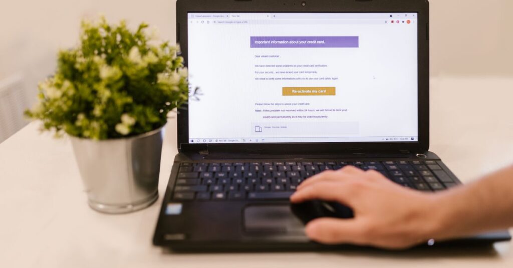 Office worker checking email and business software on a computer screen