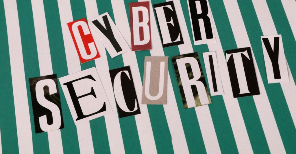 Small business owner in Southwest Florida reviewing a laptop security dashboard